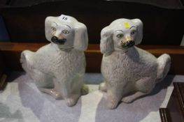 Pair of Staffordshire pot dogs