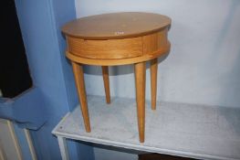 Pale oak circular table