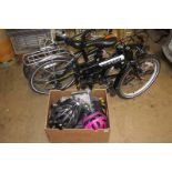 Two Dahon folding bikes; Vitesse and Boardwalk and helmets and a bag