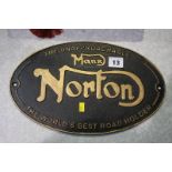 A cast Norton sign