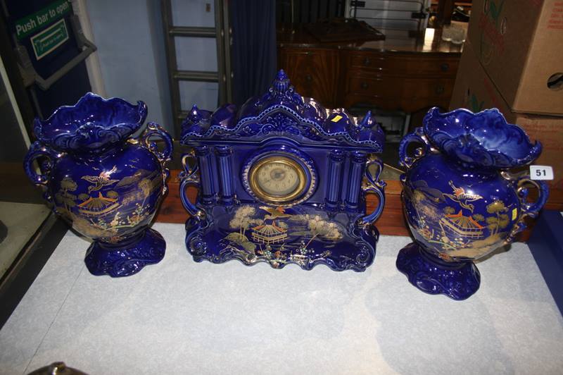 A pottery clock and garniture - Image 2 of 2