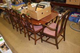 Reproduction mahogany dining table with seven chairs