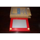 An original 'Etch a Sketch' and box