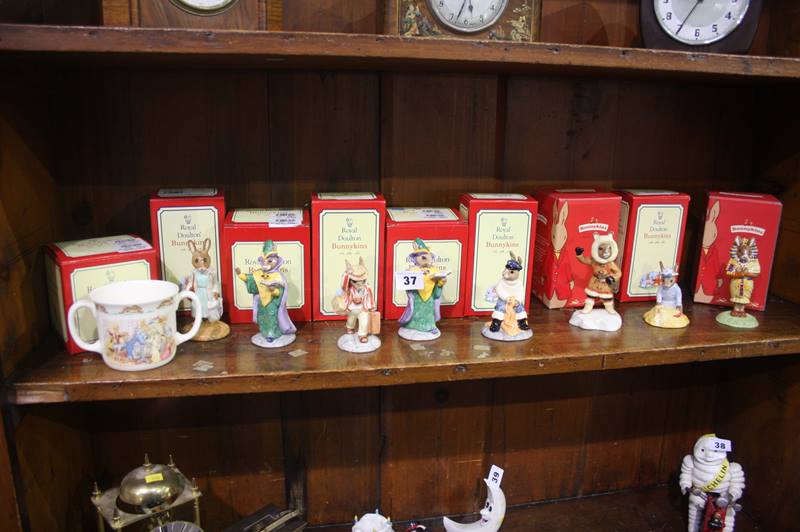 Eight Royal Doulton Bunnykins figures and a mug