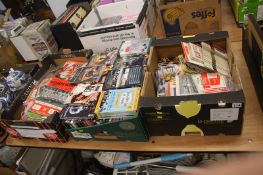 Three trays of football programmes and DVDs