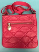 Magenta quilted lips cross body bag from Lulu Guinness
