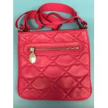 Magenta quilted lips cross body bag from Lulu Guinness