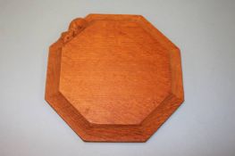 A Robert 'Mouseman' Thompson oak octagonal cheese board