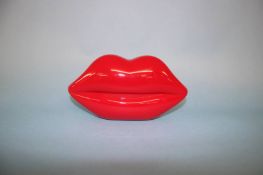 Red perspex Lips clutch bag from Lulu Guinness
