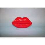 Red perspex Lips clutch bag from Lulu Guinness