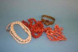 Four coral necklaces and a yellow metal and coral bracelet etc.