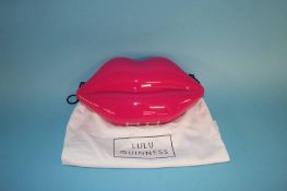 Hot Pink Perspex Lips clutch bag from Lulu Guinness, with dust bag