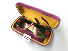 A pair of 'as new' Gucci sunglasses, with labels, case and bag