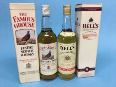 Two 75cl bottles of Famous Grouse Whiskey and two bottles of Bells Whiskey (4)