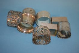 Two pairs of silver napkin ring holders and four silver napkin rings 6.9 oz/ 215 grams