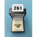 A 9ct gold diamond cluster ring, size 'S', 3.1 grams