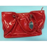 Red patent handbag from Lulu Guiness, with lip lining, with dust bag