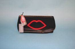 Large Black and Red 'Cut Out Lip' clutch bag from Lulu Guinness