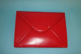 Red leather Catherine envelope clutch bag from Lulu Guinness, with dust bag