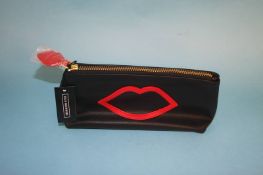 Large Black and Red 'Cut Out Lip' clutch bag from Lulu Guinness