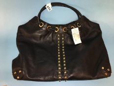 A Michael Kors black leather tote bag, new with tags