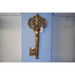 A large gilded composite wall hanging decorative key