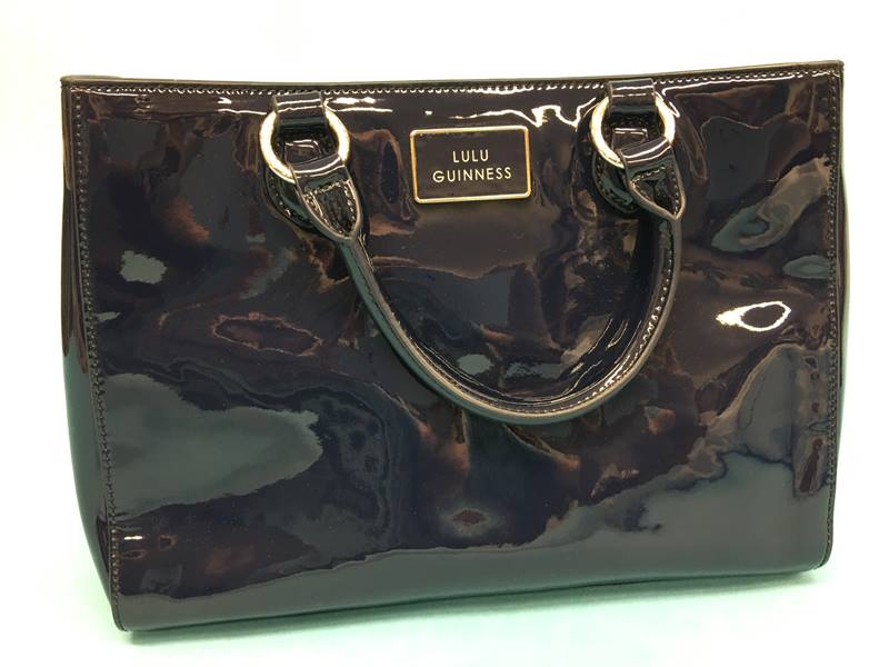 Navy patent bag from Lulu Guinness, with dust bag