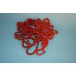 Five natural orange coral necklaces and two orange beaded coral necklaces (7)