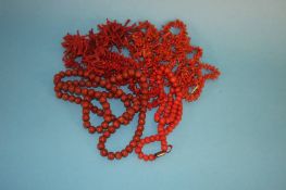 Five natural orange coral necklaces and two orange beaded coral necklaces (7)