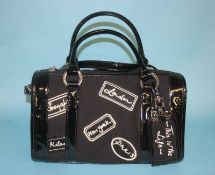 Black 'This is the Life' handbag from Lulu Guinness, with dust bag