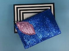 Dark Blue and Pink glitter pouch with cut-out lip from Lulu Guinness, with box