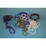 Five American Indian style necklaces and a beadwork bangle