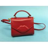 A small red polished leather 'Izzy' Mini Lip crossbody bag, with dust bag