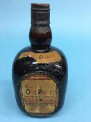 A bottle of Grand Old Parr Scotch Whiskey, contents 26.5 ounces, circa 1960s