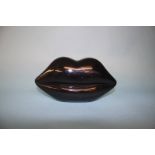 Black perspex Lips clutch bag from Lulu Guinness