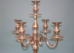 A modern tall four branch silver coloured candelabra, 163cm height