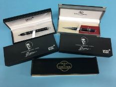 Three boxed Mont Blanc style ball point pens, a Louis Codan pen and a Pierre Cardin style magnifying