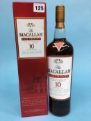 A bottle of The Macallan Cask Strength Highland Single Malt Scotch Whisley 10 Year Old, 1 litre,