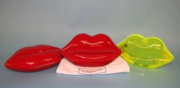 Neon Green Perspex Lips clutch bag from Lulu Guinness and two Red perspex Lips clutch bags, some