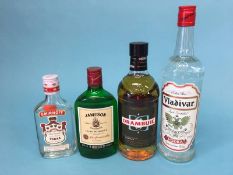 A 20cl bottle of Smirnoff vodka, a bottle of Jamesons Irish Whiskey 500ml, a bottle of Drambuie 70cl