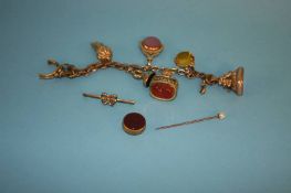 A 9ct gold bar brooch, a seed pearl stick pin and a yellow metal bracelet with fobs, various