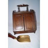 Oak coal scuttle with mechanical door opening hand