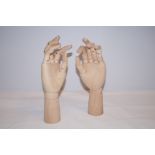 2 Wooden hands with articulating fingers