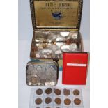 Tin containing large collection of coins