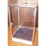 Display case with base draw