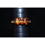 9ct Gold hessonite ring set with garnet with coa S