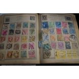 Early stamp album containing many British, Victori