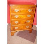 Faux Walnut chest of drawers by Ian Smith