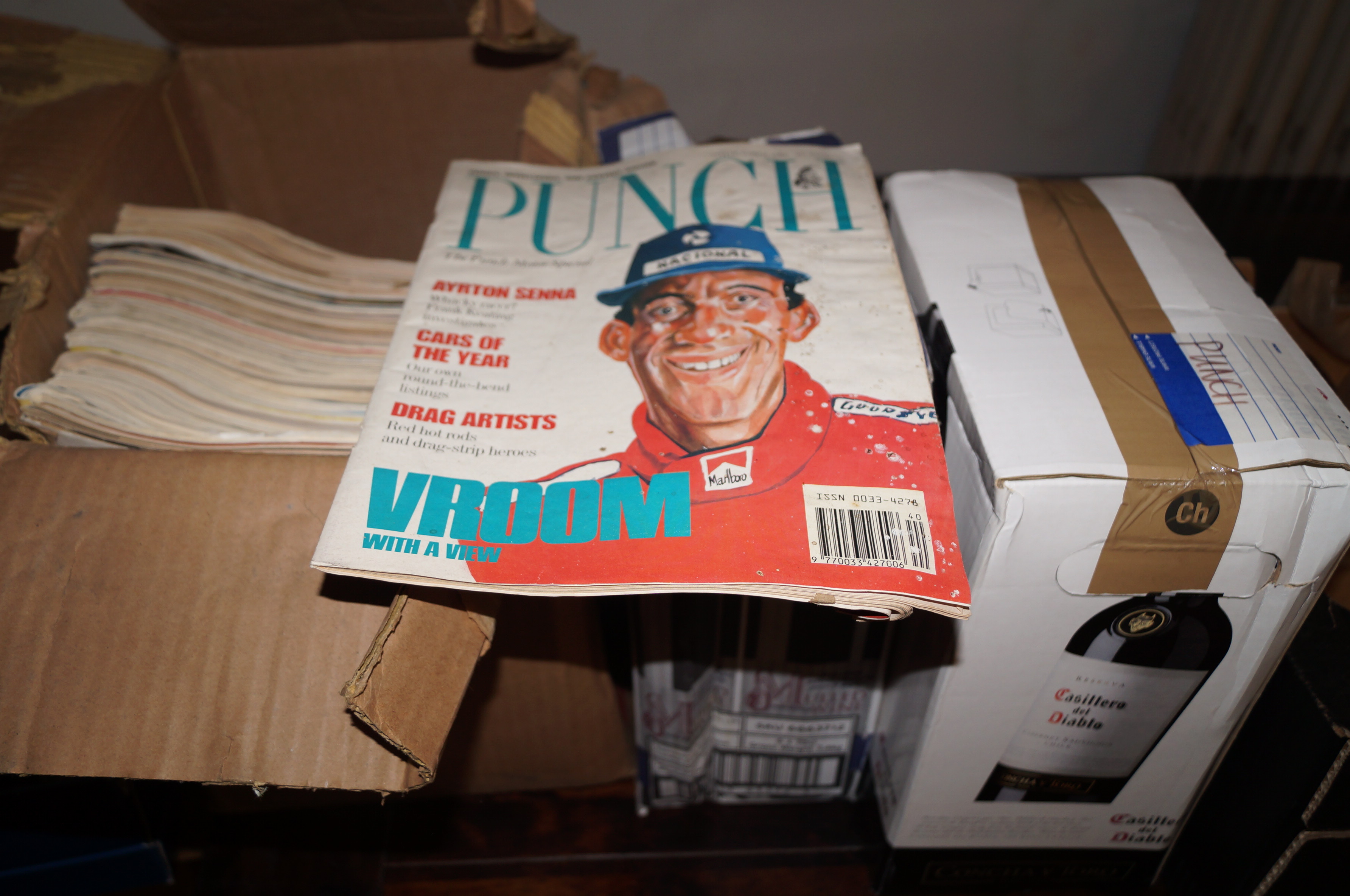 3 Boxes of punch magazines from the 1980's