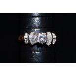 18 ct Gold & diamond ring central solitaire with b